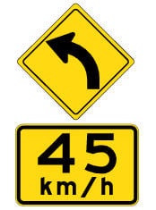 Curve with 45 km/h advisory speed sign